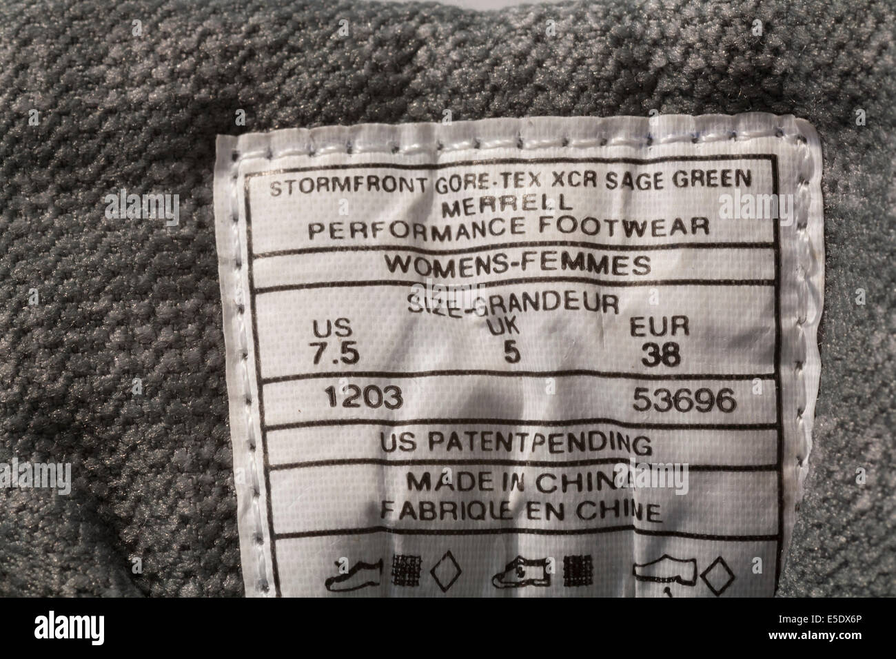 Etichetta di Merrell scarpa camminata calzature delle prestazioni effettuate in Cina Foto Stock