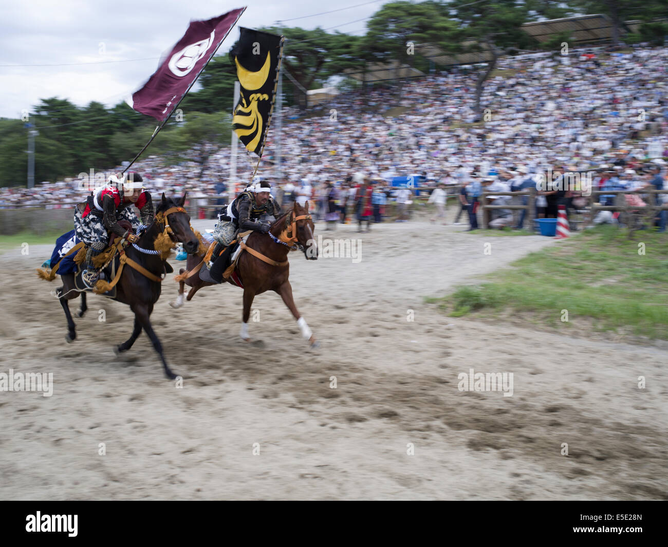 Soma Nomaoi un tradizionale samurai giapponese horseman festival tenutosi a Minami Soma, Fukushima Prefettura, Giappone. La zona è ancora riprendendo dal 2011 Tohoku terremoto e tsunami. Credito: Chris Willson/Alamy Live News Foto Stock