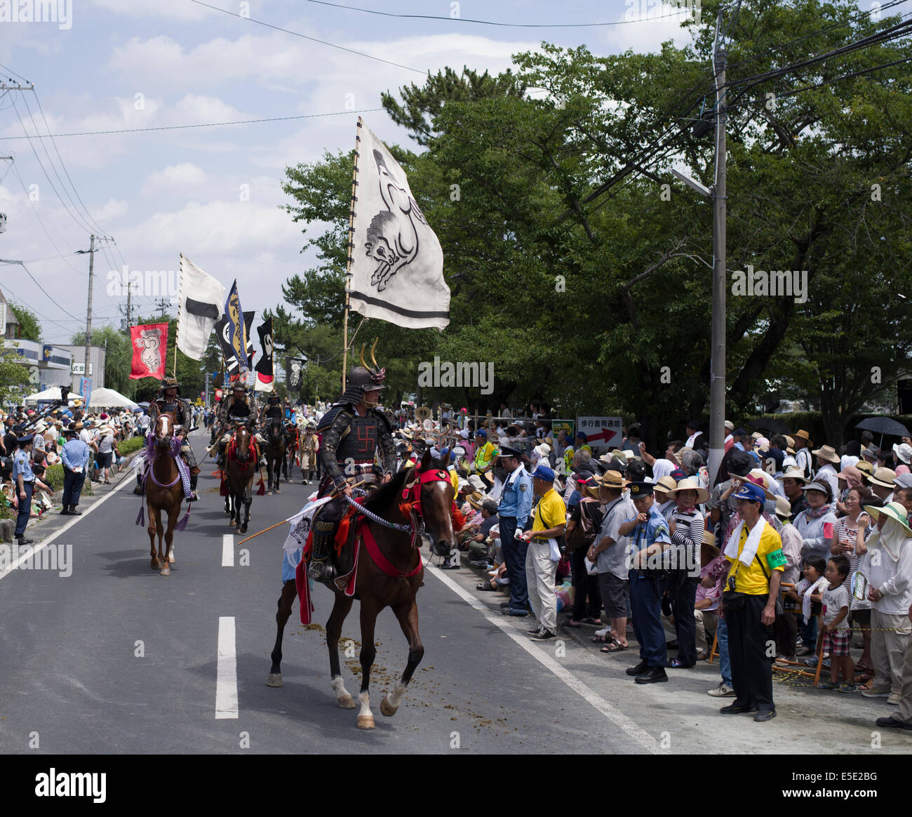 Soma Nomaoi un tradizionale samurai giapponese horseman festival tenutosi a Minami Soma, Fukushima Prefettura, Giappone. La zona è ancora riprendendo dal 2011 Tohoku terremoto e tsunami. Credito: Chris Willson/Alamy Live News Foto Stock