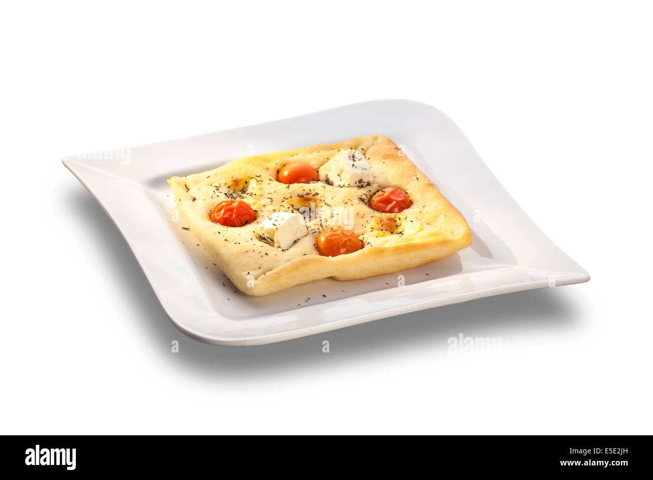 Oltre al forno piatti gourmet pane tostato con pomodoro e formaggio isolato su piastra bianca Foto Stock