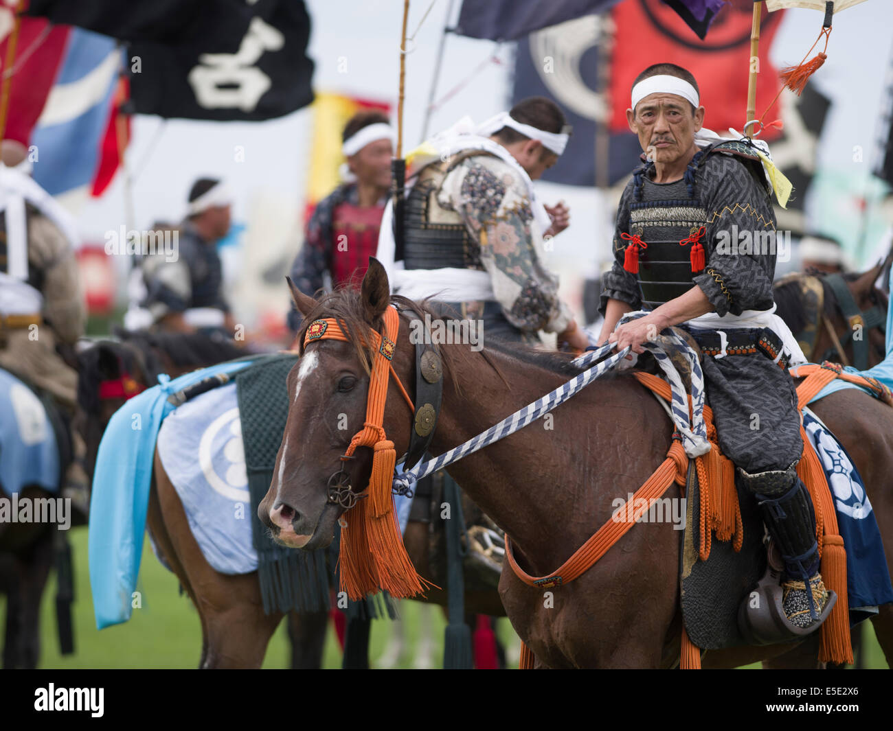 Soma Nomaoi un tradizionale samurai giapponese horseman festival tenutosi a Minami Soma, Fukushima Prefettura, Giappone. La zona è ancora riprendendo dal 2011 Tohoku terremoto e tsunami. Credito: Chris Willson/Alamy Live News Foto Stock