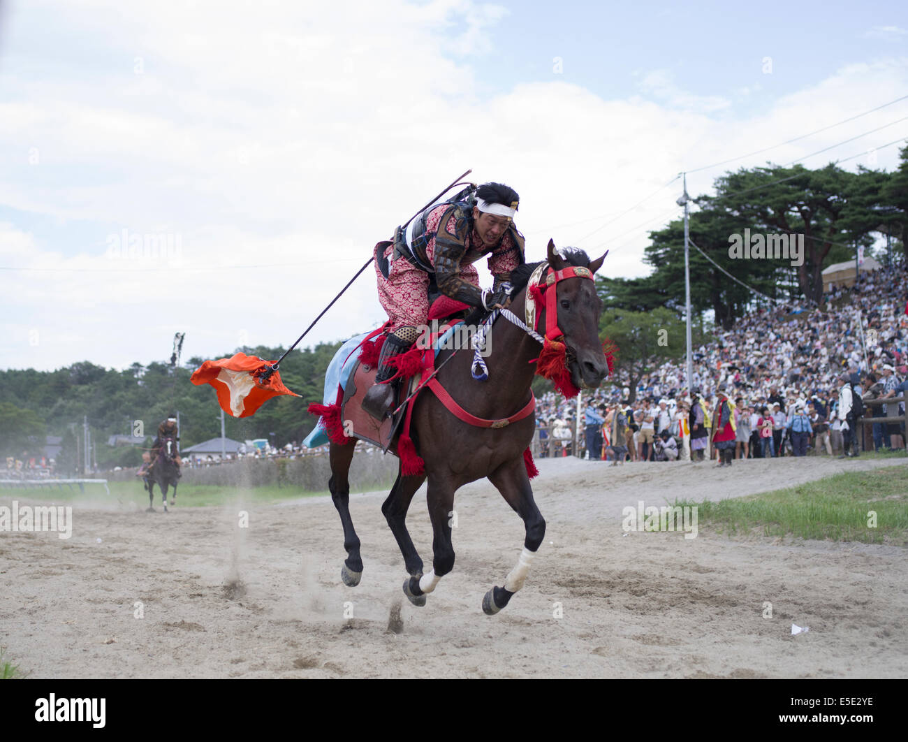 Soma Nomaoi un tradizionale samurai giapponese horseman festival tenutosi a Minami Soma, Fukushima Prefettura, Giappone. La zona è ancora riprendendo dal 2011 Tohoku terremoto e tsunami. Credito: Chris Willson/Alamy Live News Foto Stock