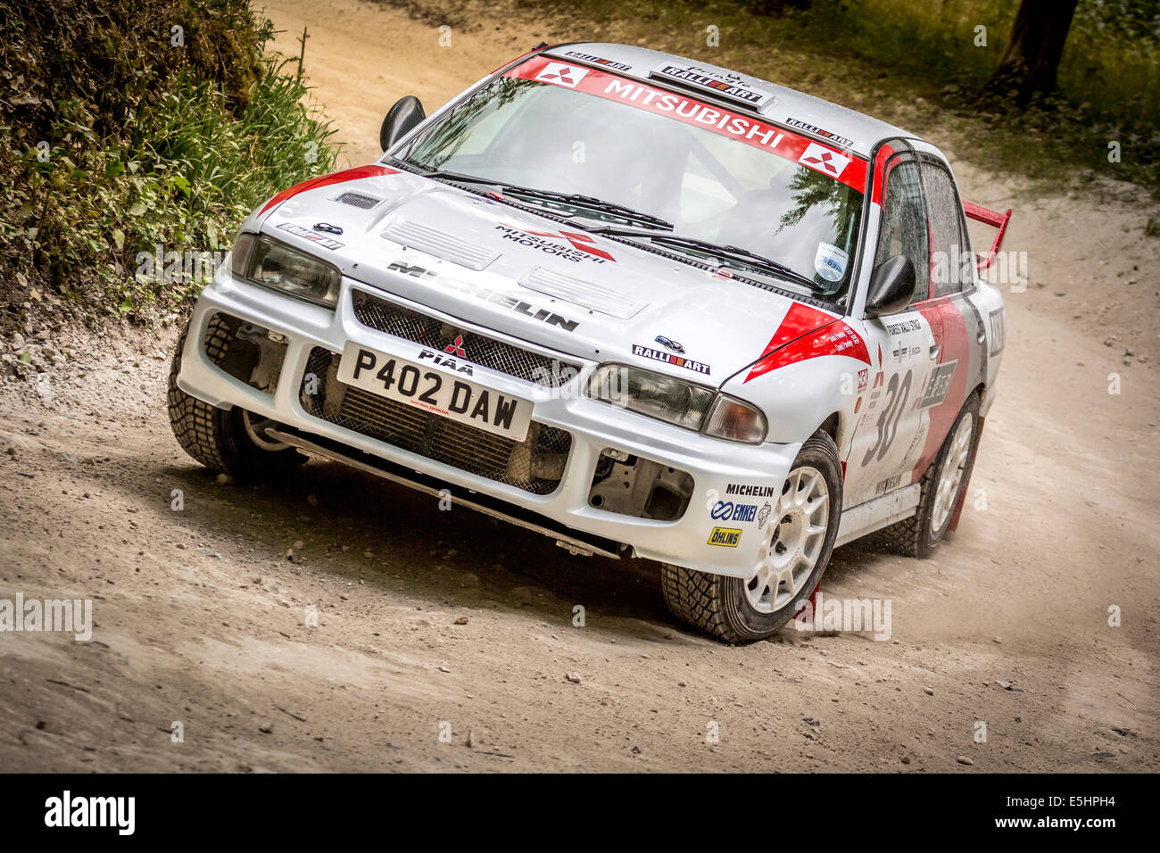 1996 Mitsubishi Lancer EVO III con conducente Jade Paveley sulla tappa di rally al 2014 Goodwood Festival of Speed, Sussex, Regno Unito. Foto Stock