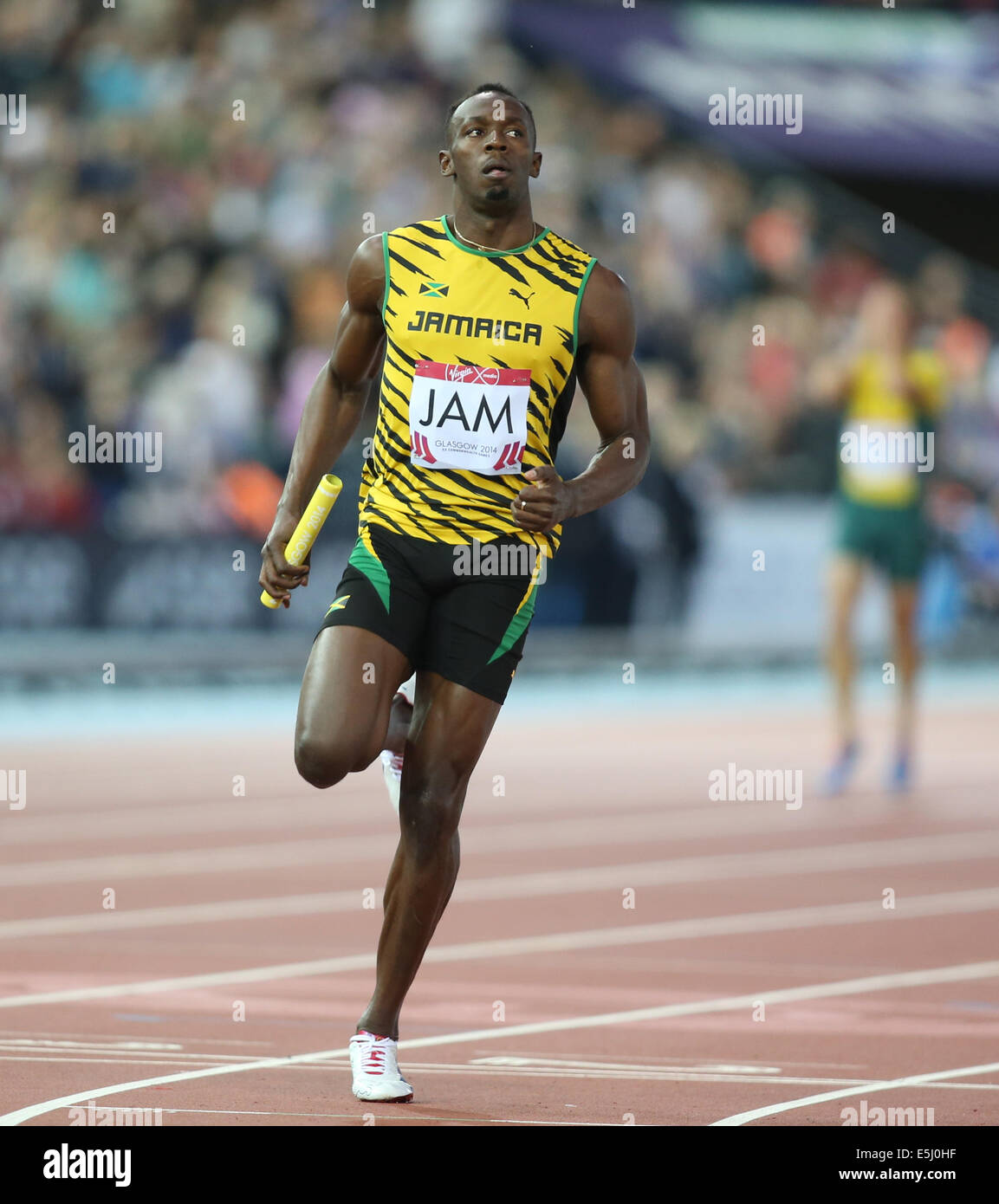 Glasgow, Scozia. 01 Ago, 2014. Glasgow Giochi del Commonwealth. Usain Bolt corre la tappa finale degli Uomini Staffetta 4 x 100m il calore per la Giamaica, finitura prima e tenendo la Giamaica alla finale. Credito: Azione Sport Plus/Alamy Live News Foto Stock