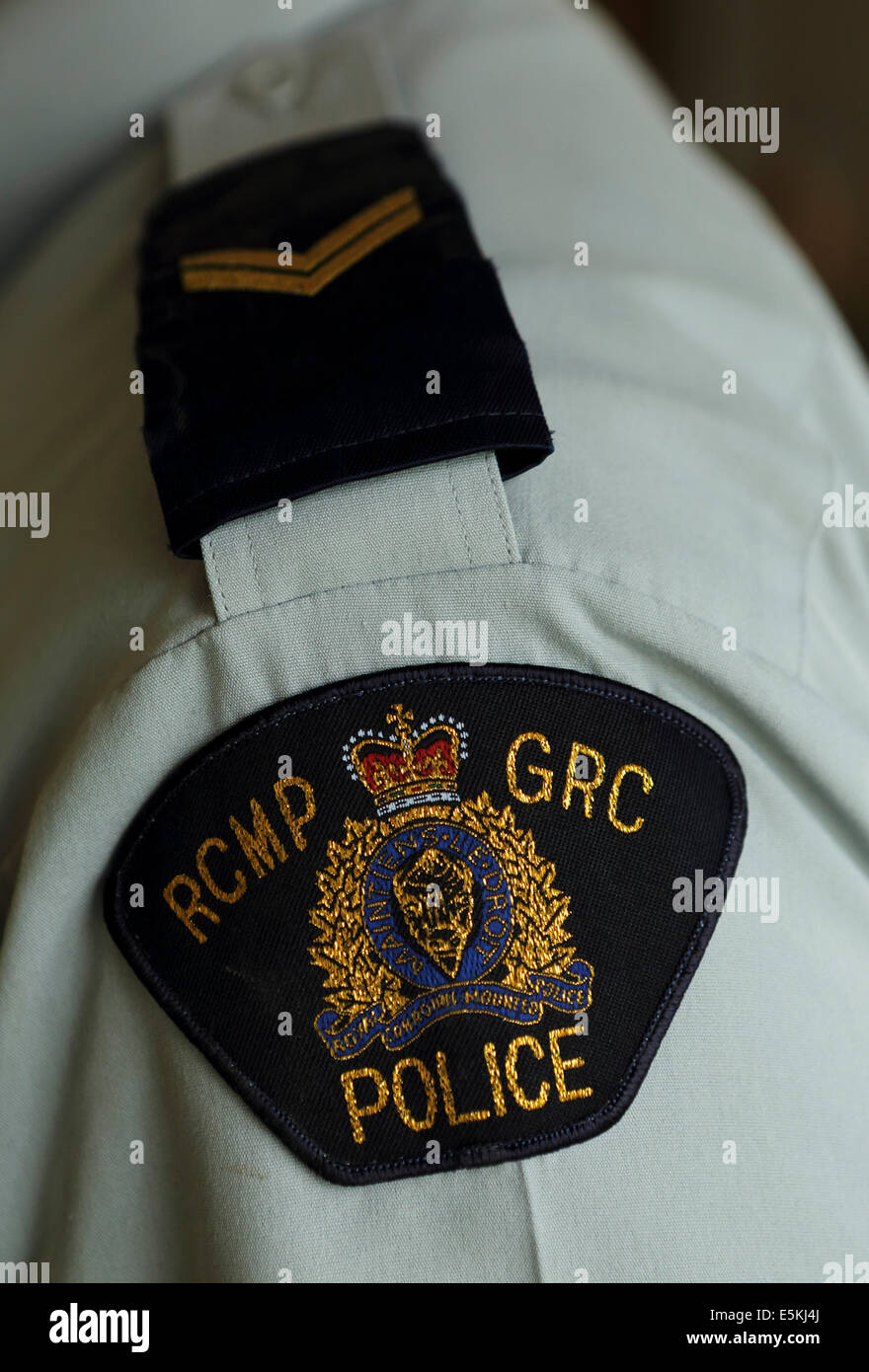 Un Royal Canadian polizia montata (GRC) caporale della spalla di scudetti in deposito della divisione in Regina, Saskatchewan. Foto Stock