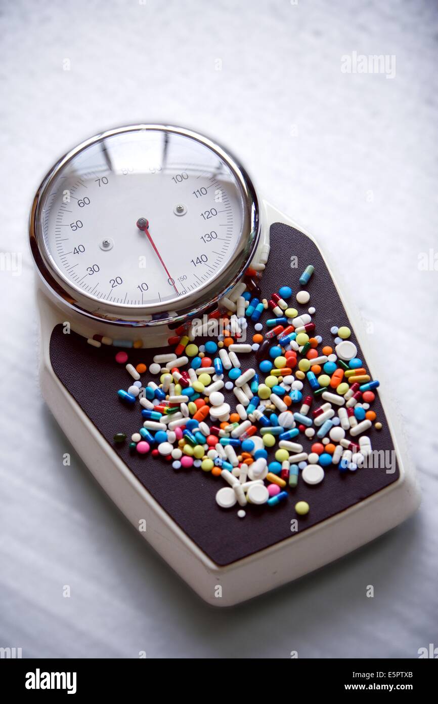 Farmaci su una scala, per illustrare anorexiant (soppressore appetito) farmaci. Foto Stock