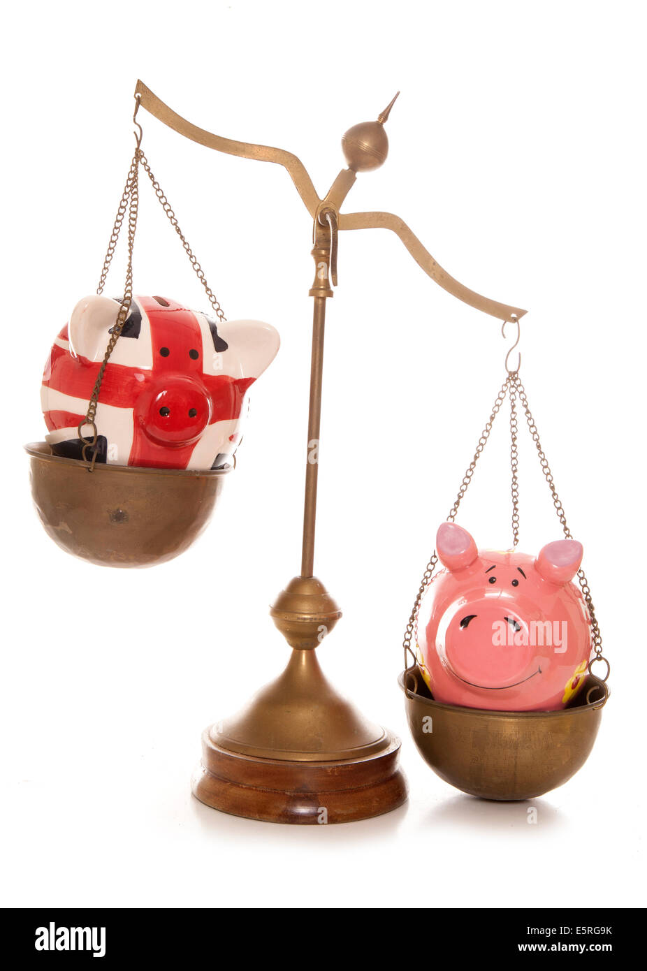 La pesatura delle migliori dei conti di risparmio di esclusione di studio Foto Stock