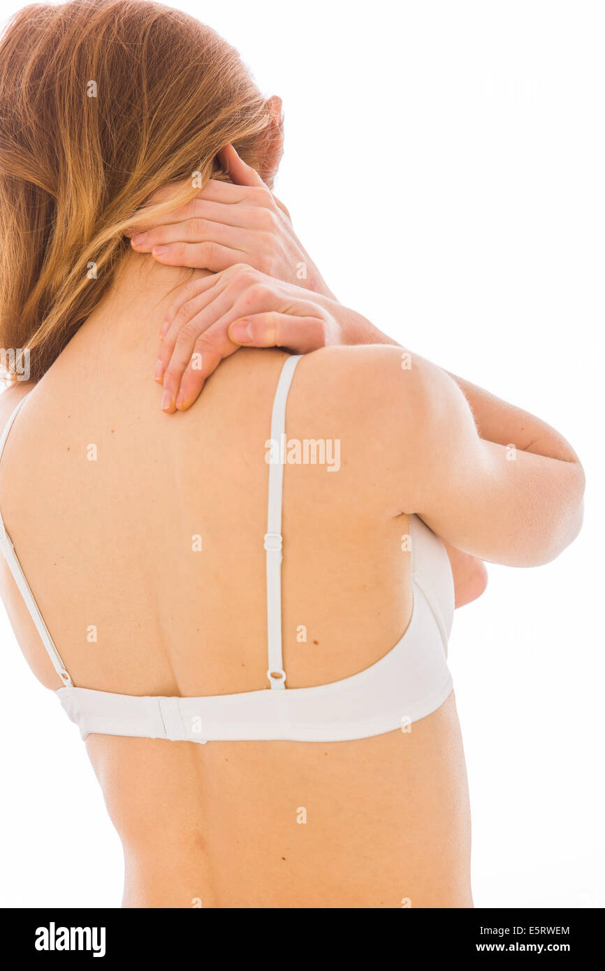 La donna che soffre di dolori al collo. Foto Stock