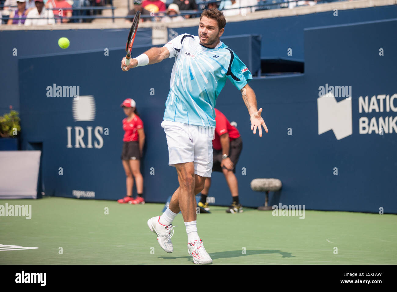 Toronto, Canada. 07 Ago, 2014. Swiss tennis player Stan Wawrinka restituisce un servire durante la sua partita contro Kevin Anderson durante il 2014 Rogers Cup essendo giocato a Toronto il 7 agosto 2014. Anderson è andato a sconfiggere Wawrinka 7-6, 7-5. Credito: Mark Spowart/Alamy Live News Foto Stock