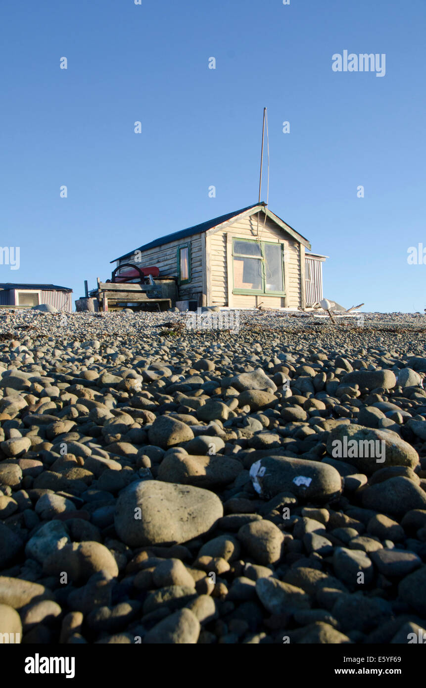 Holiday capanna, banca di boulder, Nelson, Isola del Sud, Nuova Zelanda Foto Stock