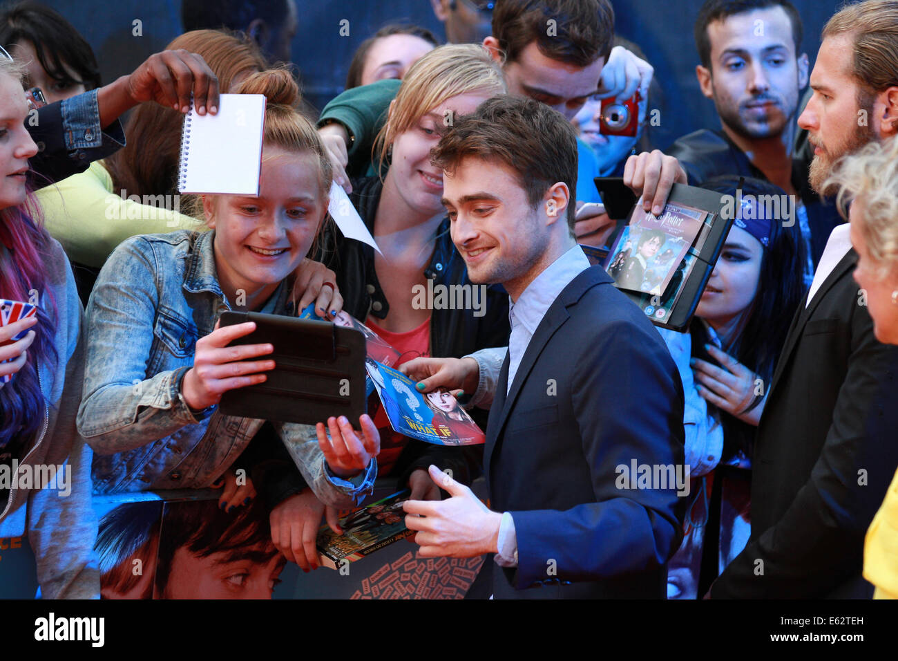 Londra, UK, 12 agosto 2014. Daniel Radcliffe assiste il Regno Unito Premiere di che cosa se all' Odeon West End di Londra, Regno Unito. Foto Stock