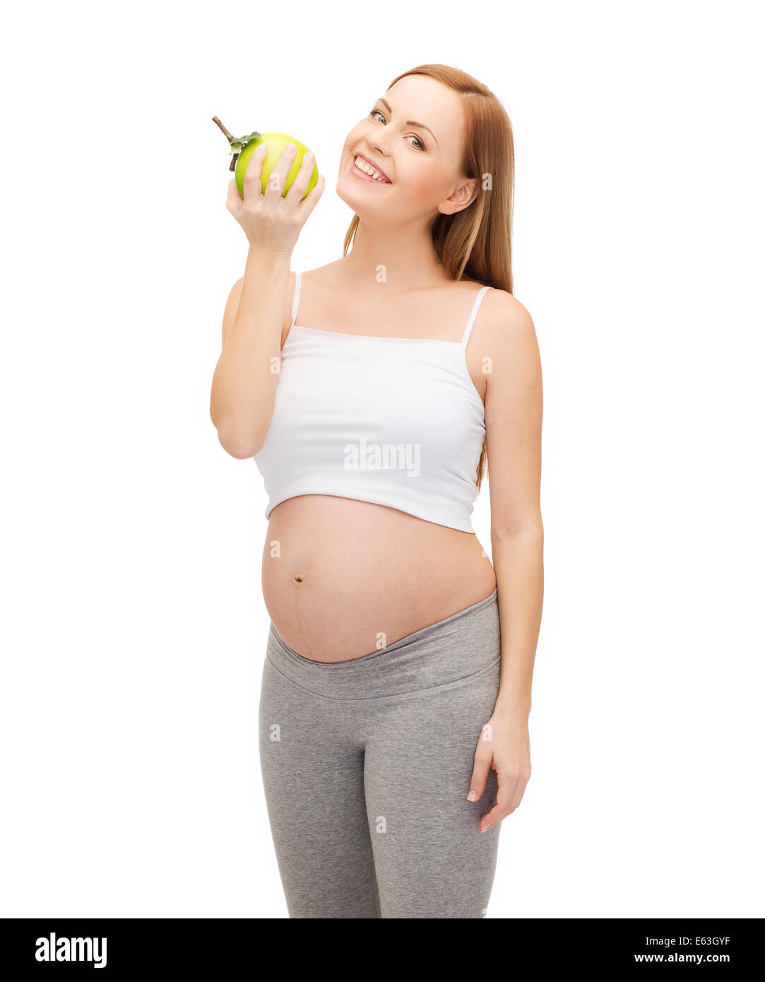 Un futuro felice madre con mela verde Foto Stock