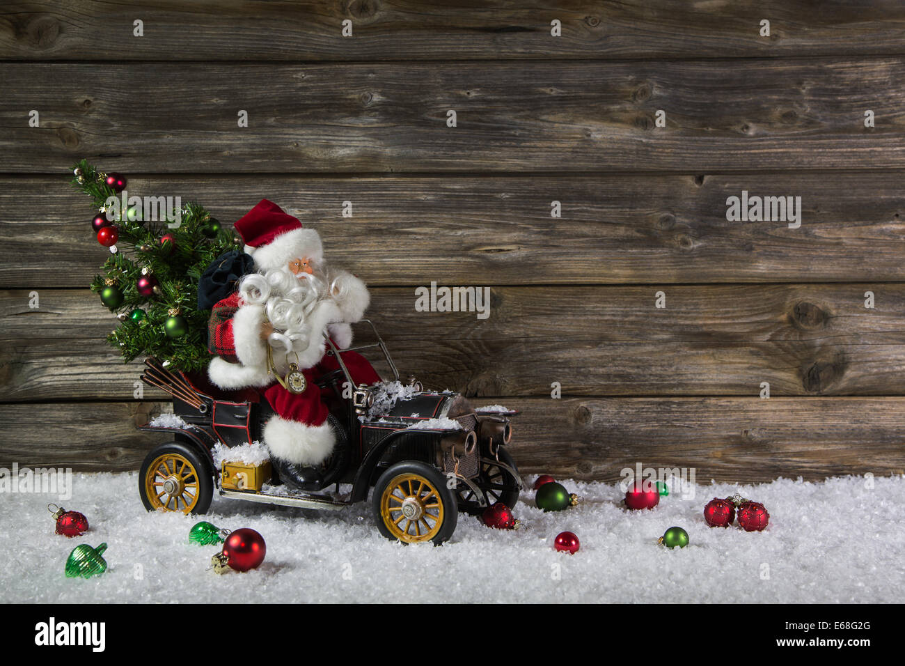 Divertente di legno sullo sfondo di Natale con Babbo Natale per un tagliando o coupon. Foto Stock