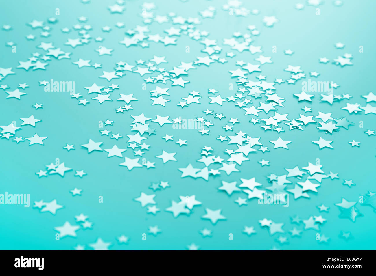 Turchese o sfondo verde con le stelle in un unico colore Foto stock - Alamy