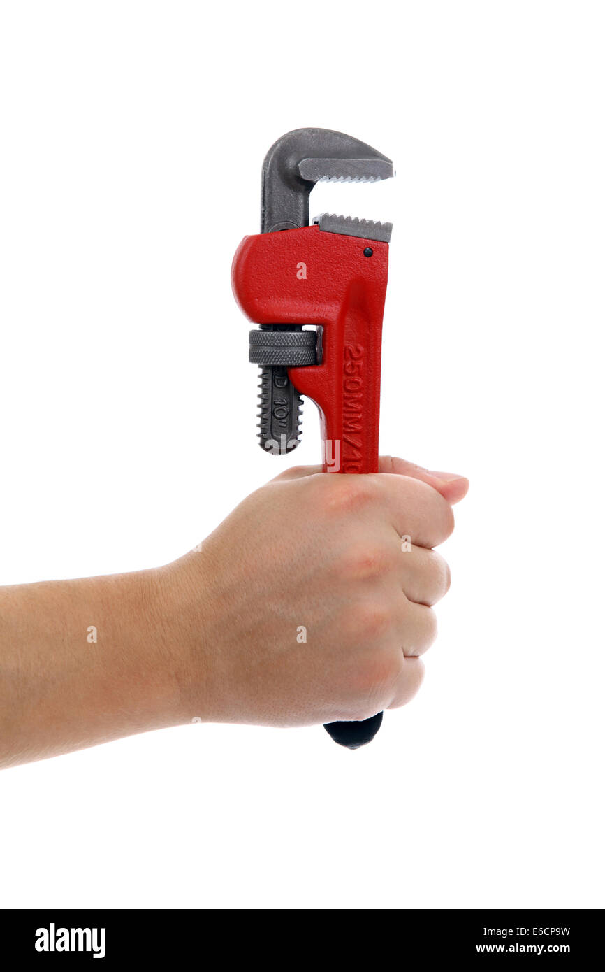 Uomo con una chiave a tubo con mano. Isolato su sfondo bianco. Foto Stock