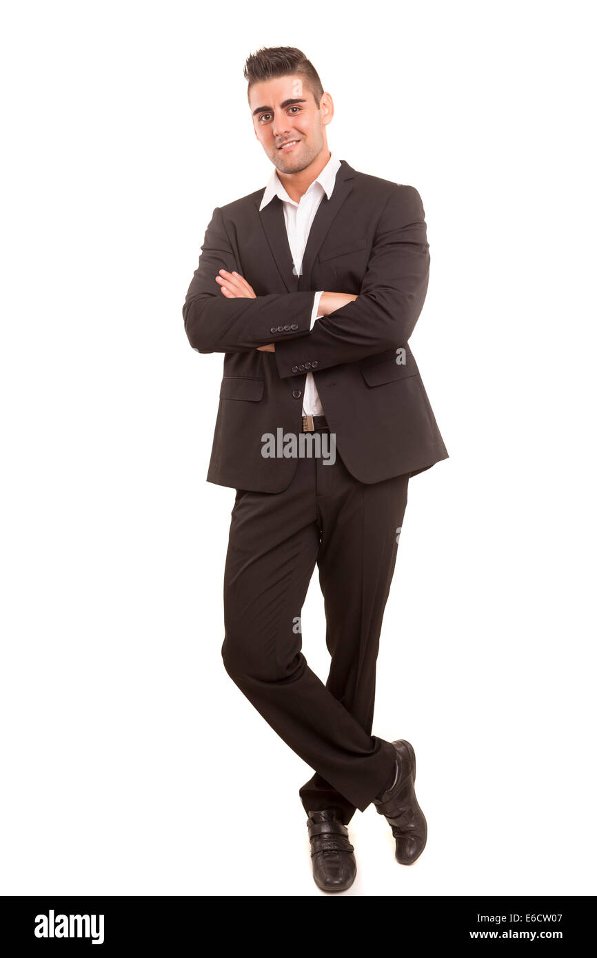 Bel giovane uomo d affari che pongono isolate su sfondo bianco Foto Stock