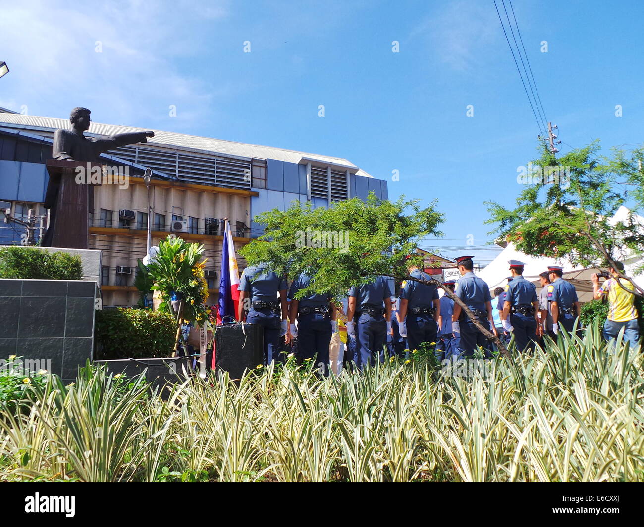 Quezon City, Filippine. 21 Agosto, 2014. Venti prima di Augusts è una vacanza nelle Filippine come l intero paese commemora l assassinio del senatore Benigno Aquino Suor (padre del Presidente Benigno 'Noynoy' Aquino Jr.) 31 anni fa nell'asfalto dell'Aeroporto Internazionale di Manila. Alla credenza popolare, la sua morte spianato la strada alla fine della dittatura nelle Filippine. Credito: Sherbien Dacalanio / Alamy Live News Foto Stock