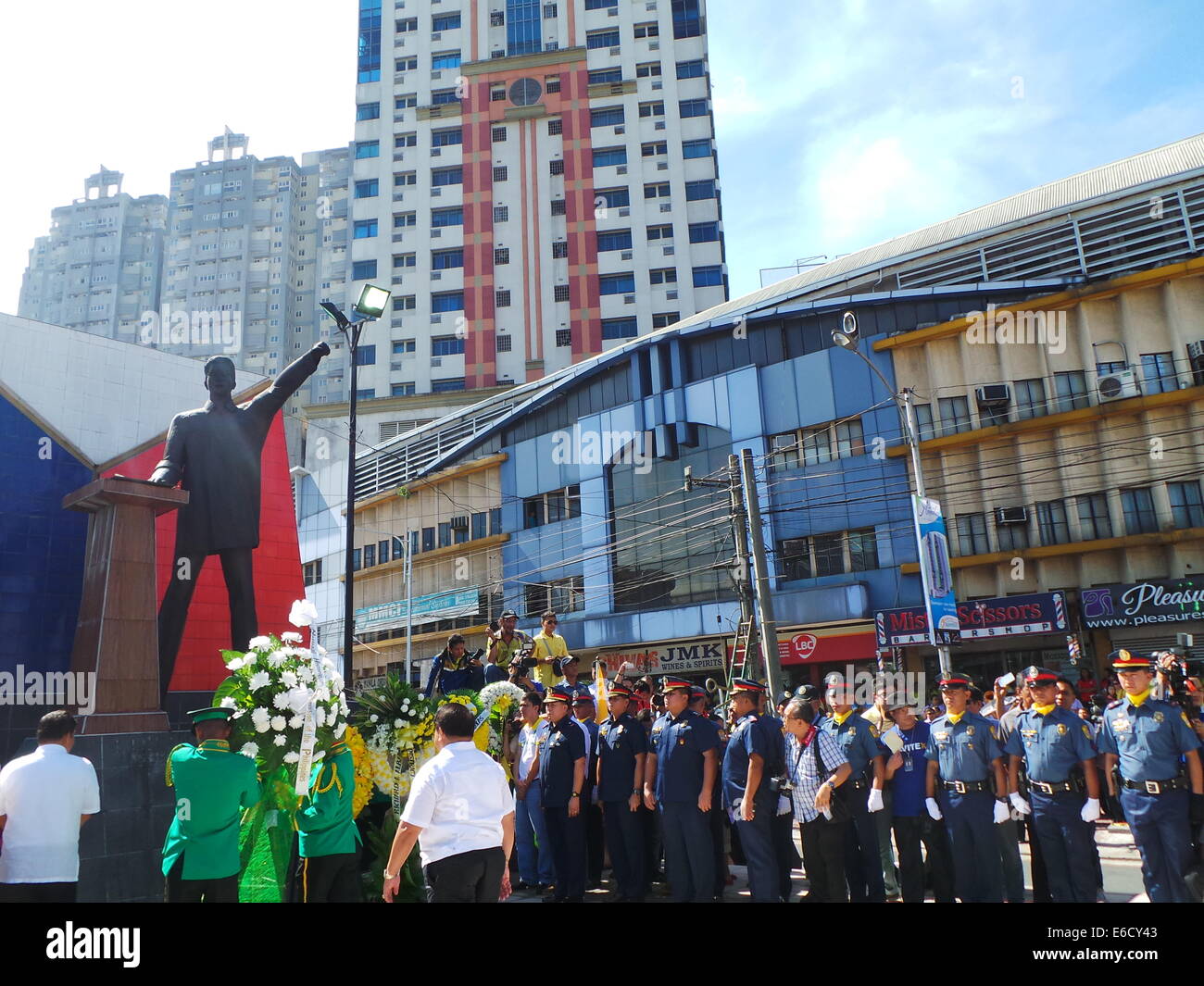Quezon City, Filippine. 21 Agosto, 2014. Venti prima di Augusts è una vacanza nelle Filippine come l intero paese commemora l assassinio del senatore Benigno Aquino Suor (padre del Presidente Benigno 'Noynoy' Aquino Jr.) 31 anni fa nell'asfalto dell'Aeroporto Internazionale di Manila. Alla credenza popolare, la sua morte spianato la strada alla fine della dittatura nelle Filippine. Credito: Sherbien Dacalanio / Alamy Live News Foto Stock