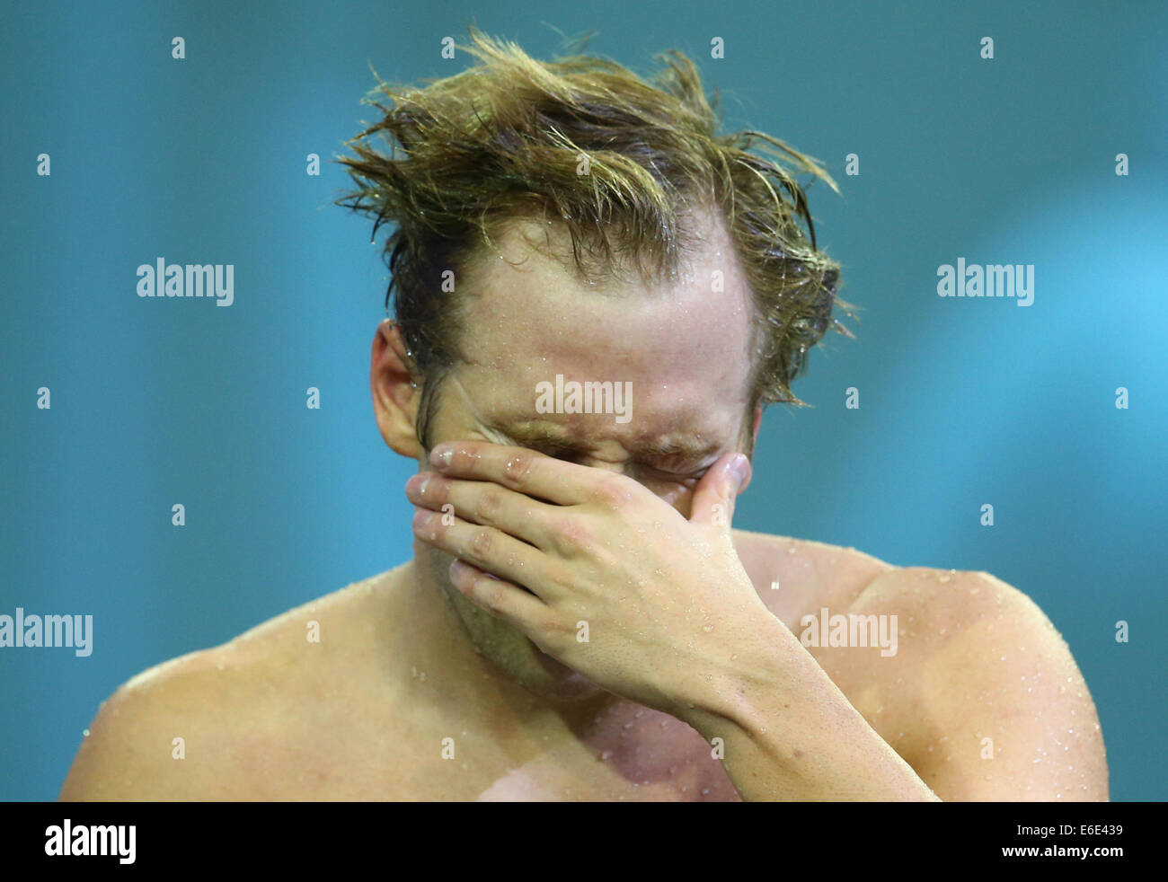 Berlino, Germania. 21 Ago, 2014. Marco Koch di Germania reagisce dopo la Uomini 200m Rana finale in occasione della trentaduesima LEN European Swimming Championships 2014 presso il velodromo di Berlino, Germania, 21 agosto 2014. Foto: David Ebener/dpa/Alamy Live News Foto Stock