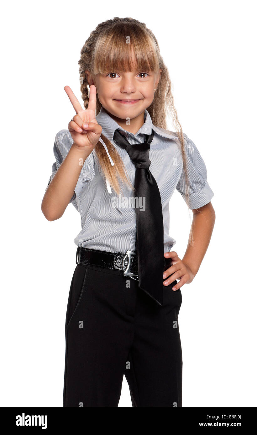Bambina in uniforme scolastica Foto Stock