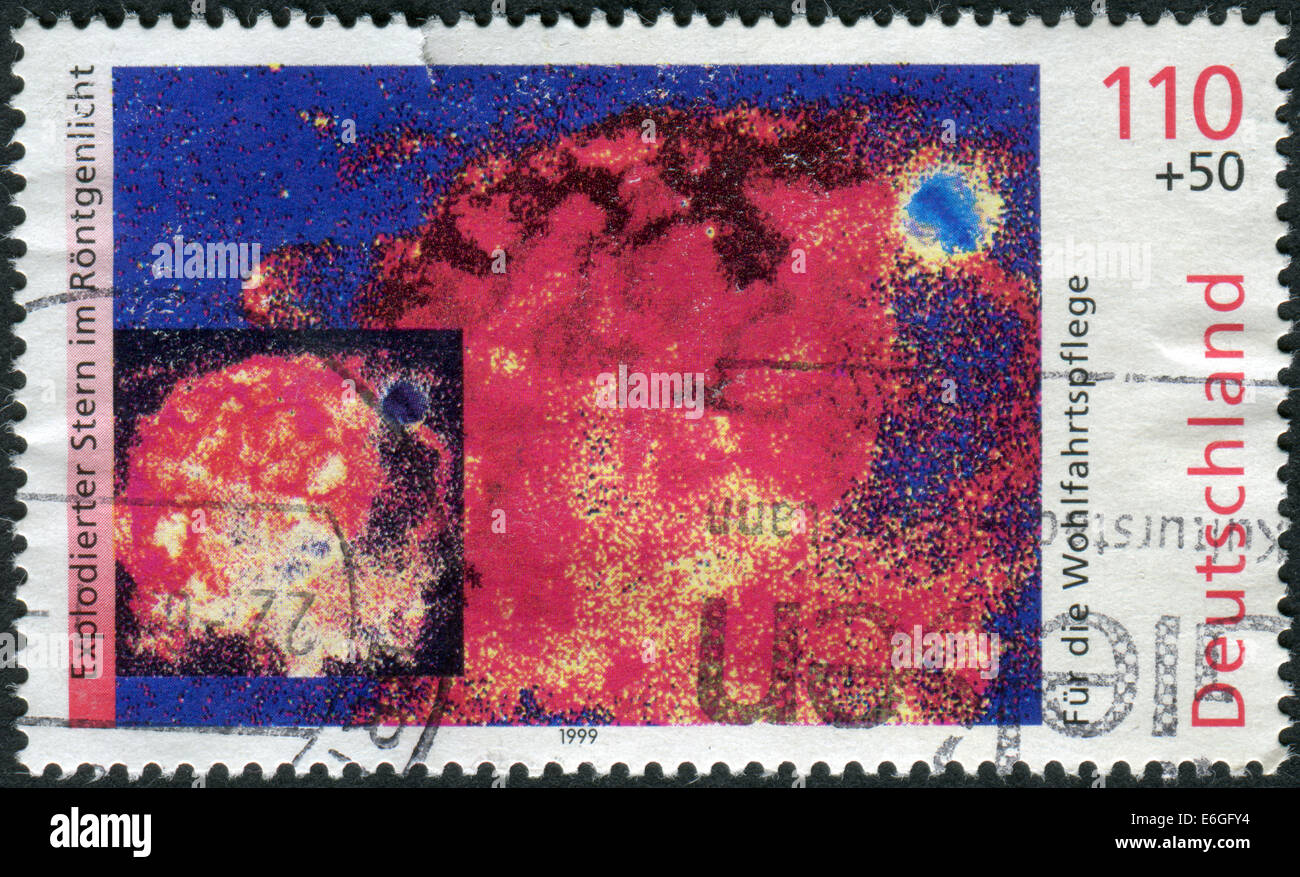 Germania - circa 1999: francobollo stampato in Germania, mostra un'immagine a raggi X di esplodere star, circa 1999 Foto Stock