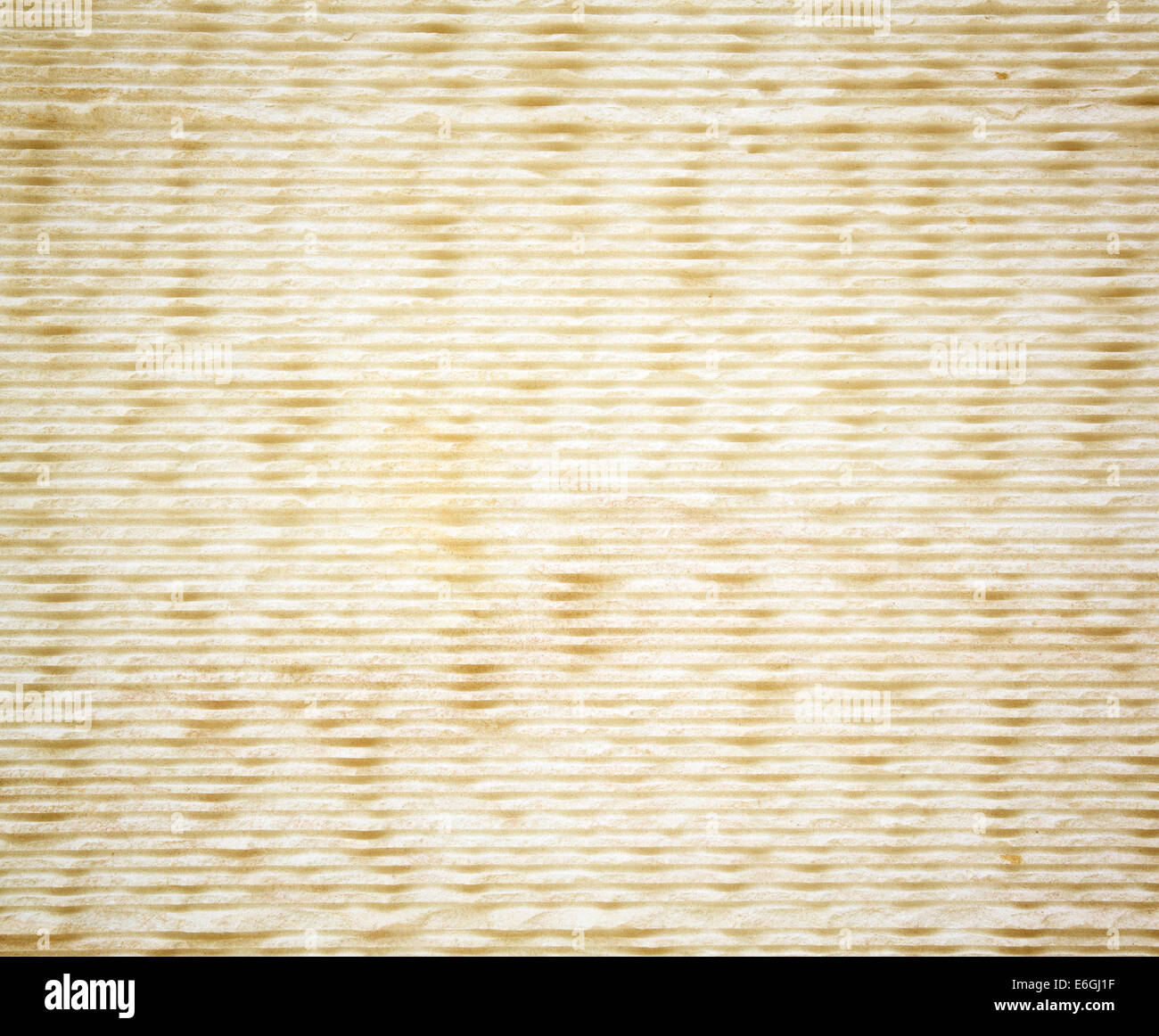 Muro di pietra la configurazione di sfondo con disegni incisi. Foto Stock