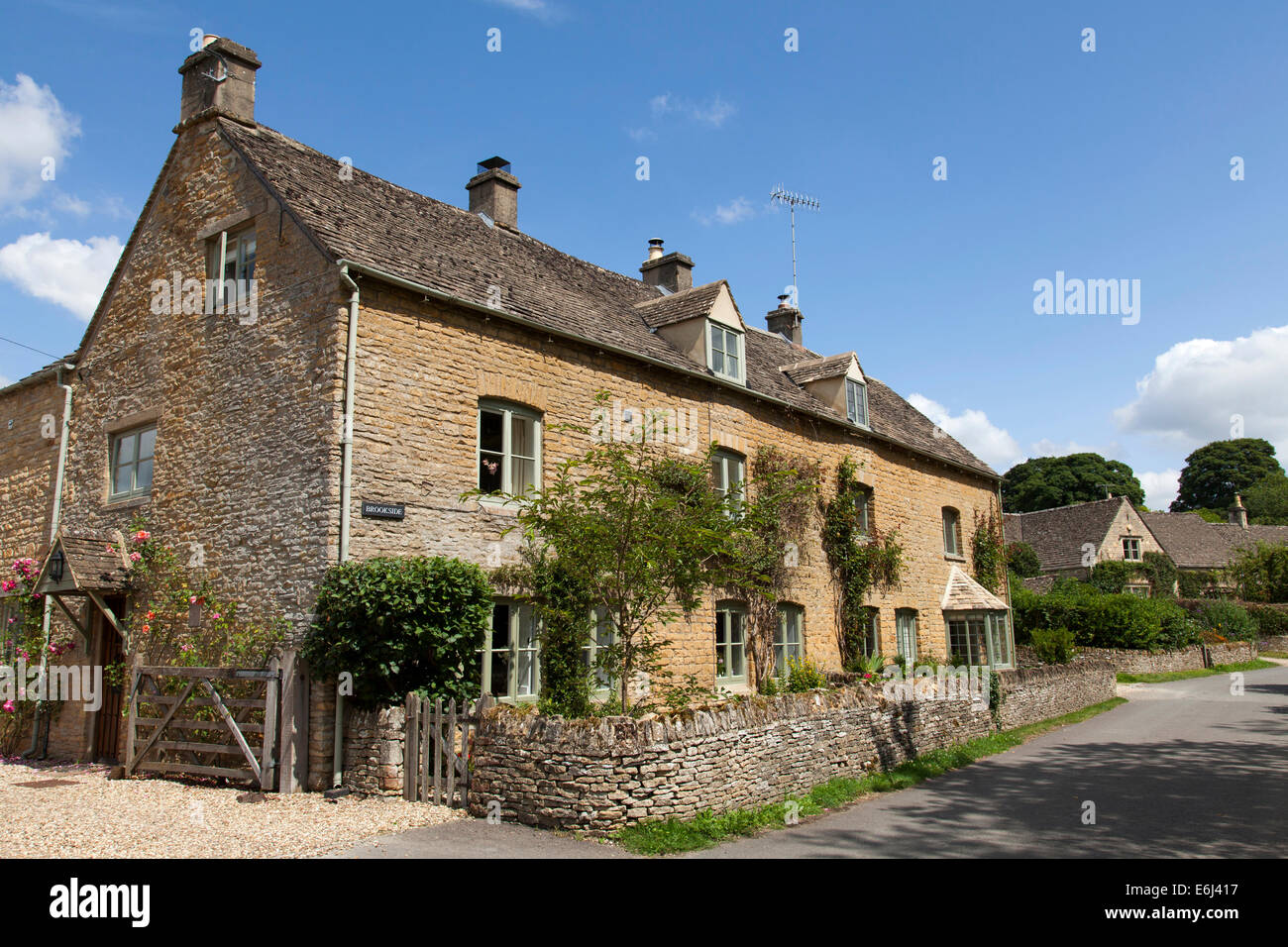Cottages in Upper Slaughter, il Costwolds, Gloucestershire, England, Regno Unito Foto Stock