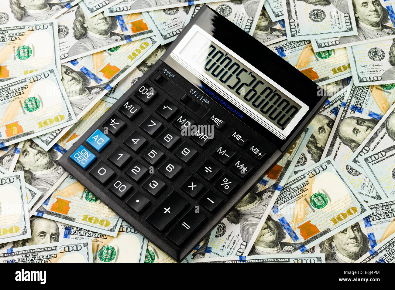 Sfondo di un centinaio di dollari banconota e calcolatrice Foto Stock