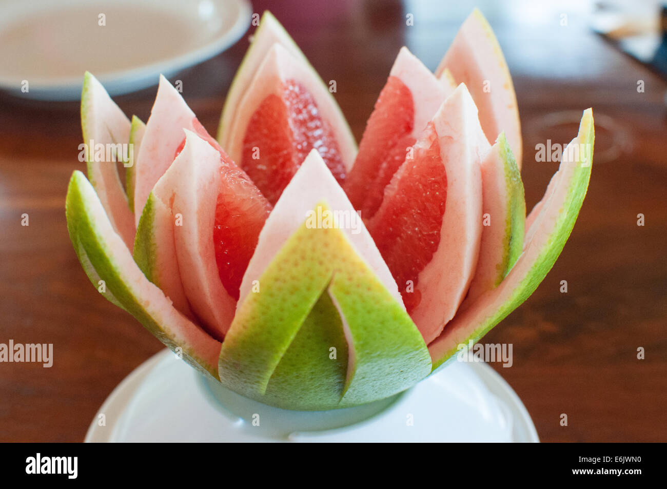 Tagliare il pompelmo Foto Stock