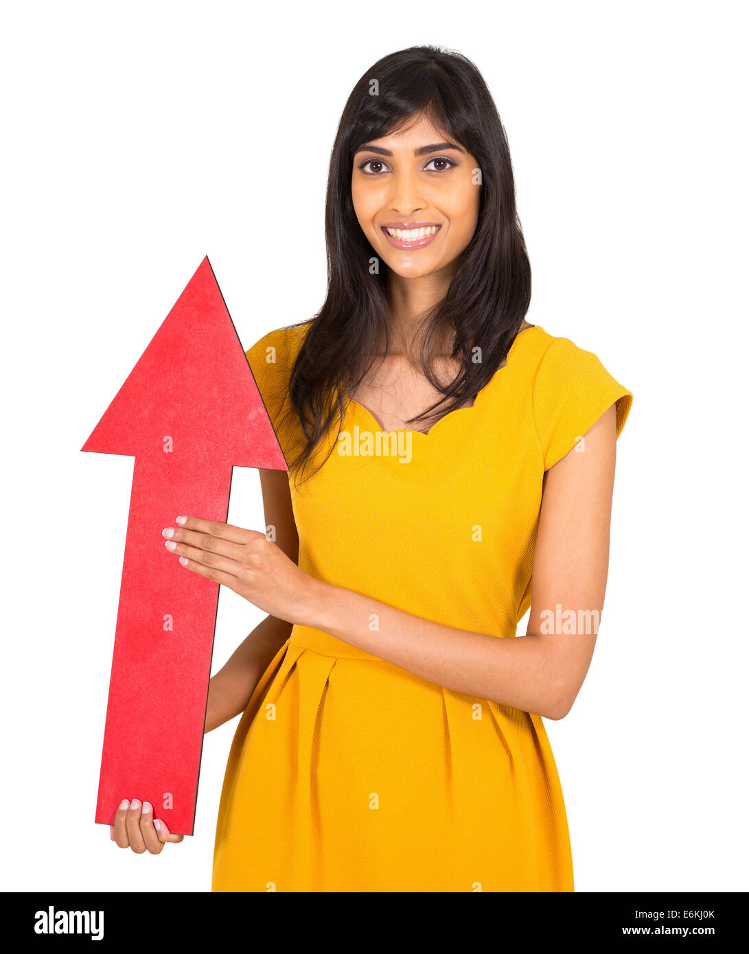 Bella ragazza indiana tenendo la direzione della freccia rivolta verso l'alto Foto Stock
