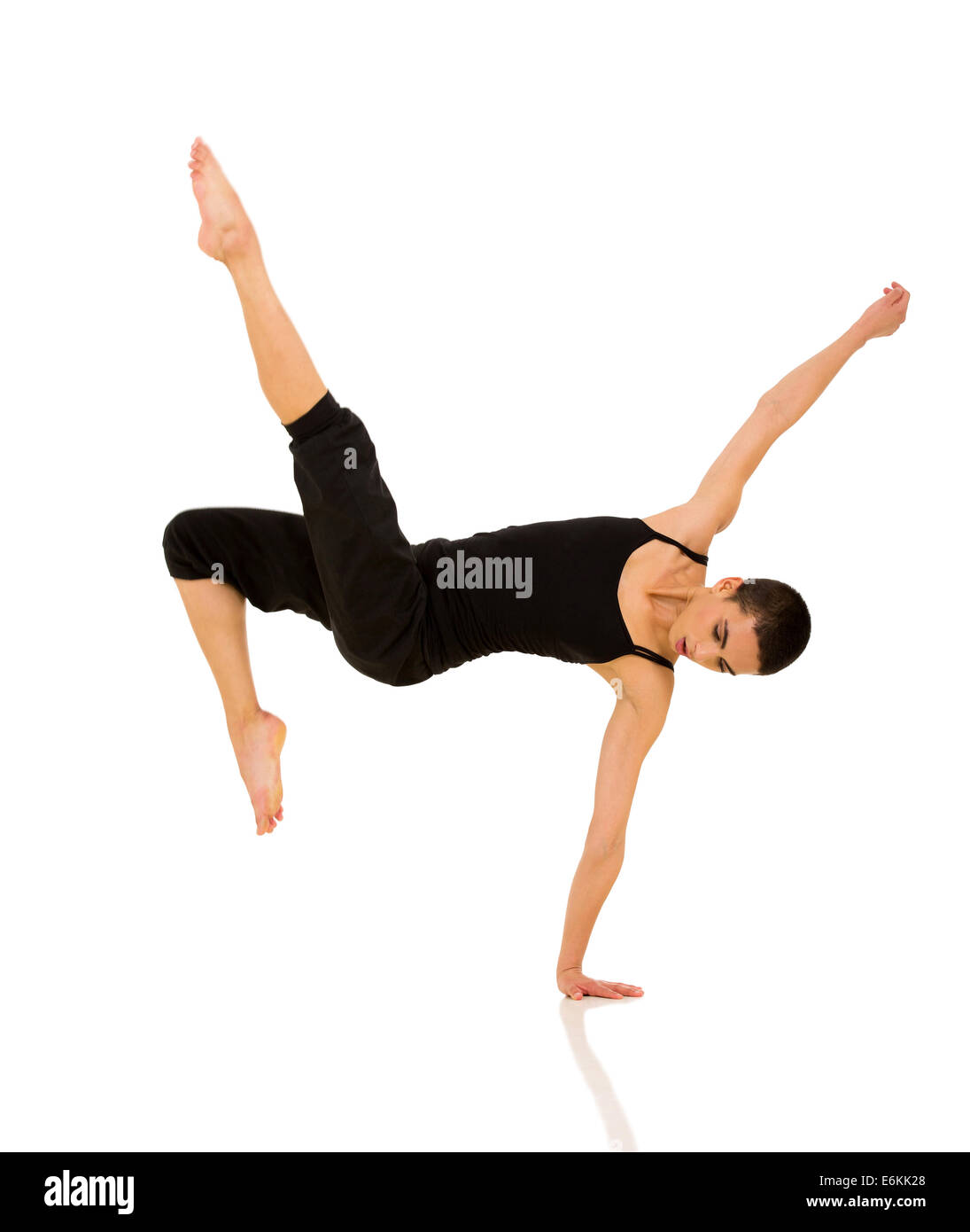 Femmina ballerino break facendo handstand isolato su bianco Foto Stock