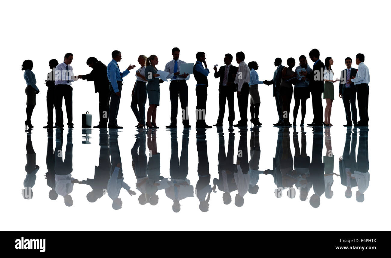 Sagome di uomini di affari che lavorano Foto Stock