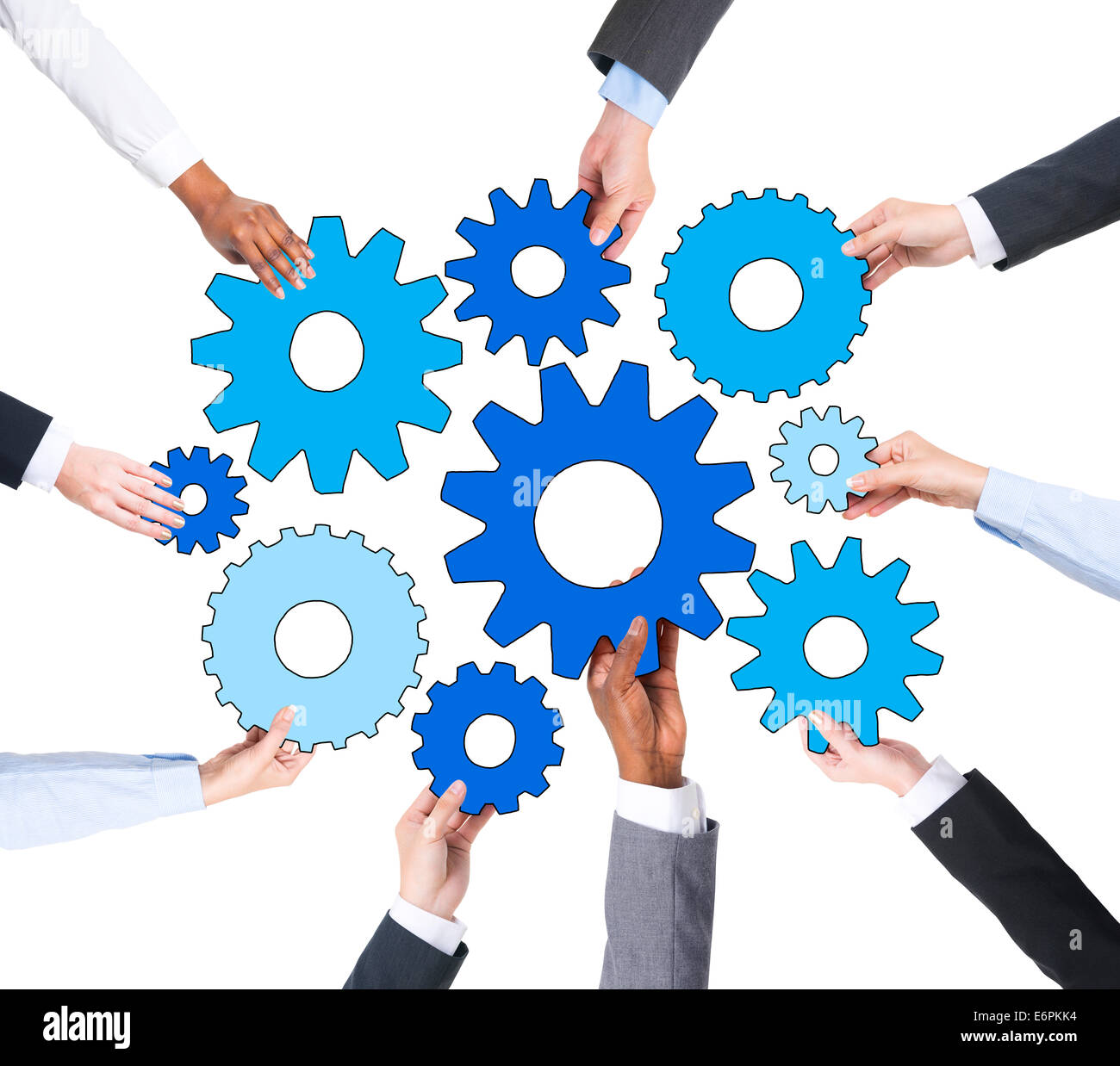 La gente di affari tenendo i simboli di marcia Foto Stock