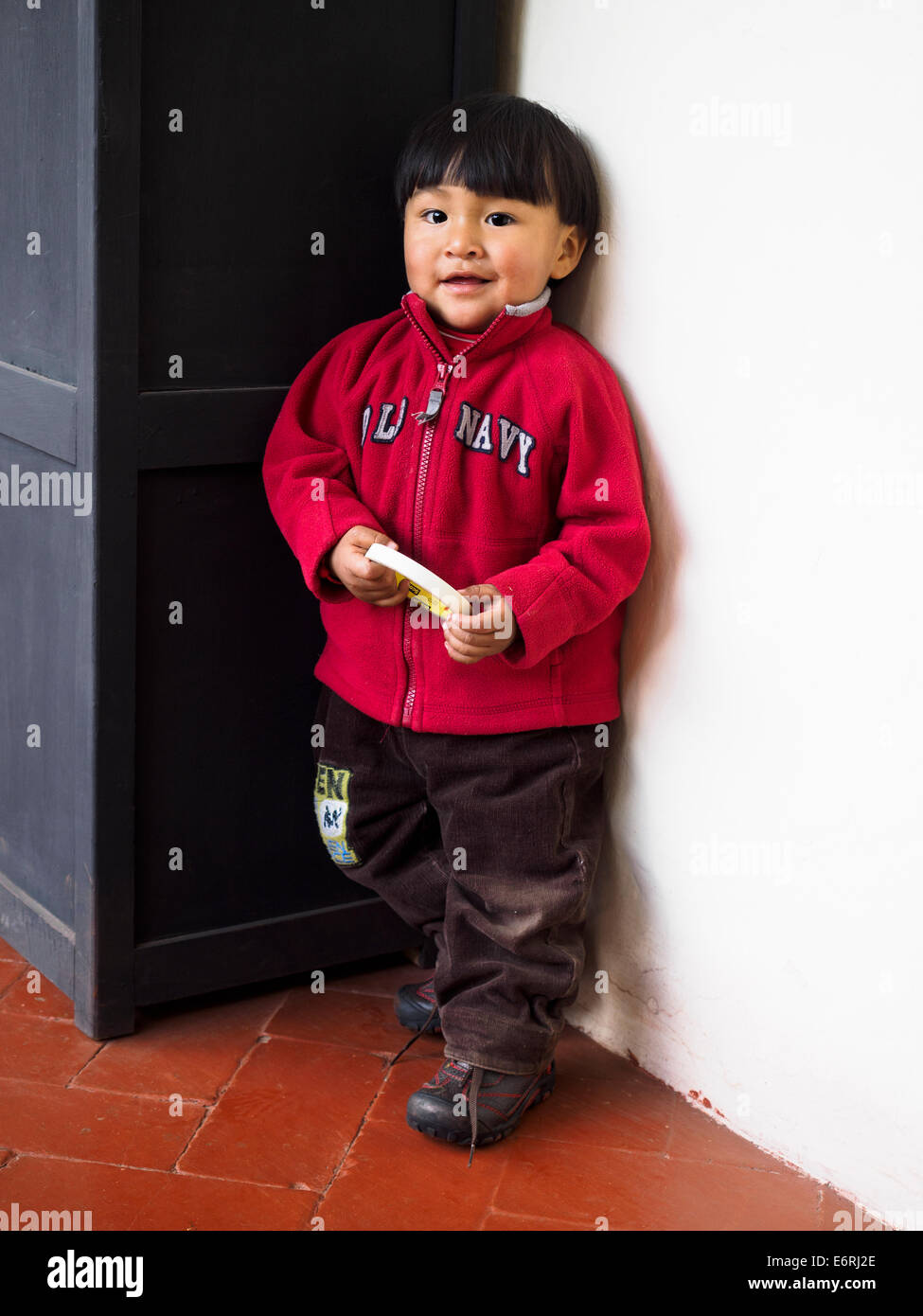 Il quechua boy sorridenti - Museo Inca, Cusco, Perù Foto Stock