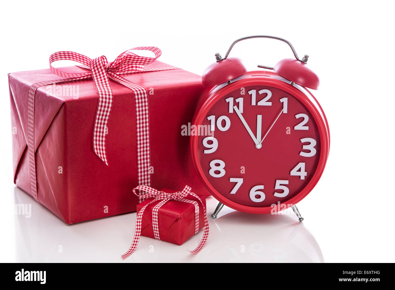 Natale: Big Red in confezione regalo con sveglia rossa - Last minute shopping di Natale Foto Stock