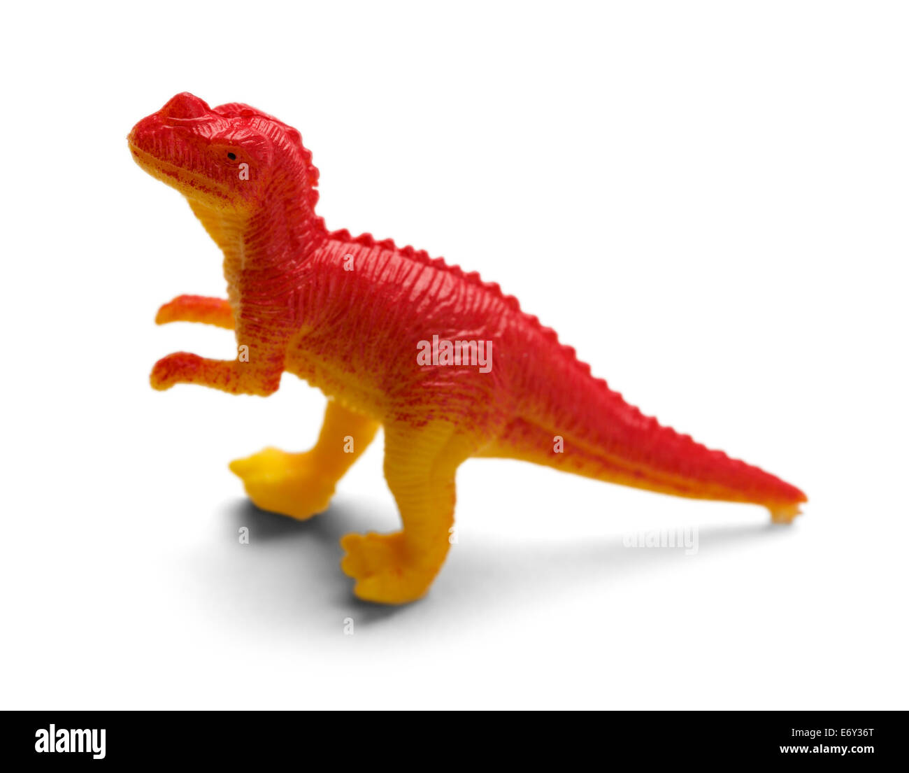 Plastica dinosauro rosso isolato su sfondo bianco. Foto Stock