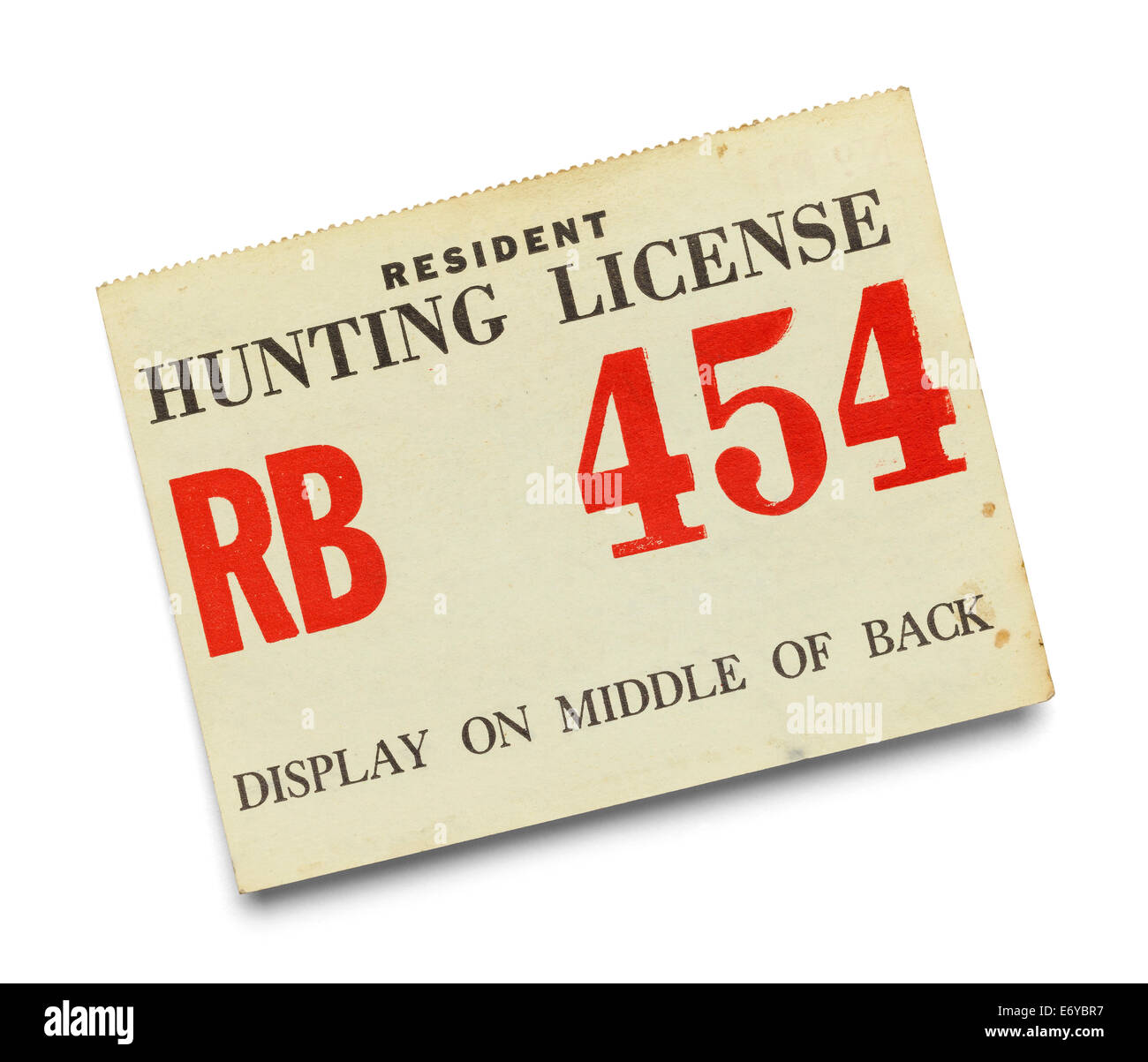 Carta vecchia licenza di caccia isolati su sfondo bianco. Foto Stock