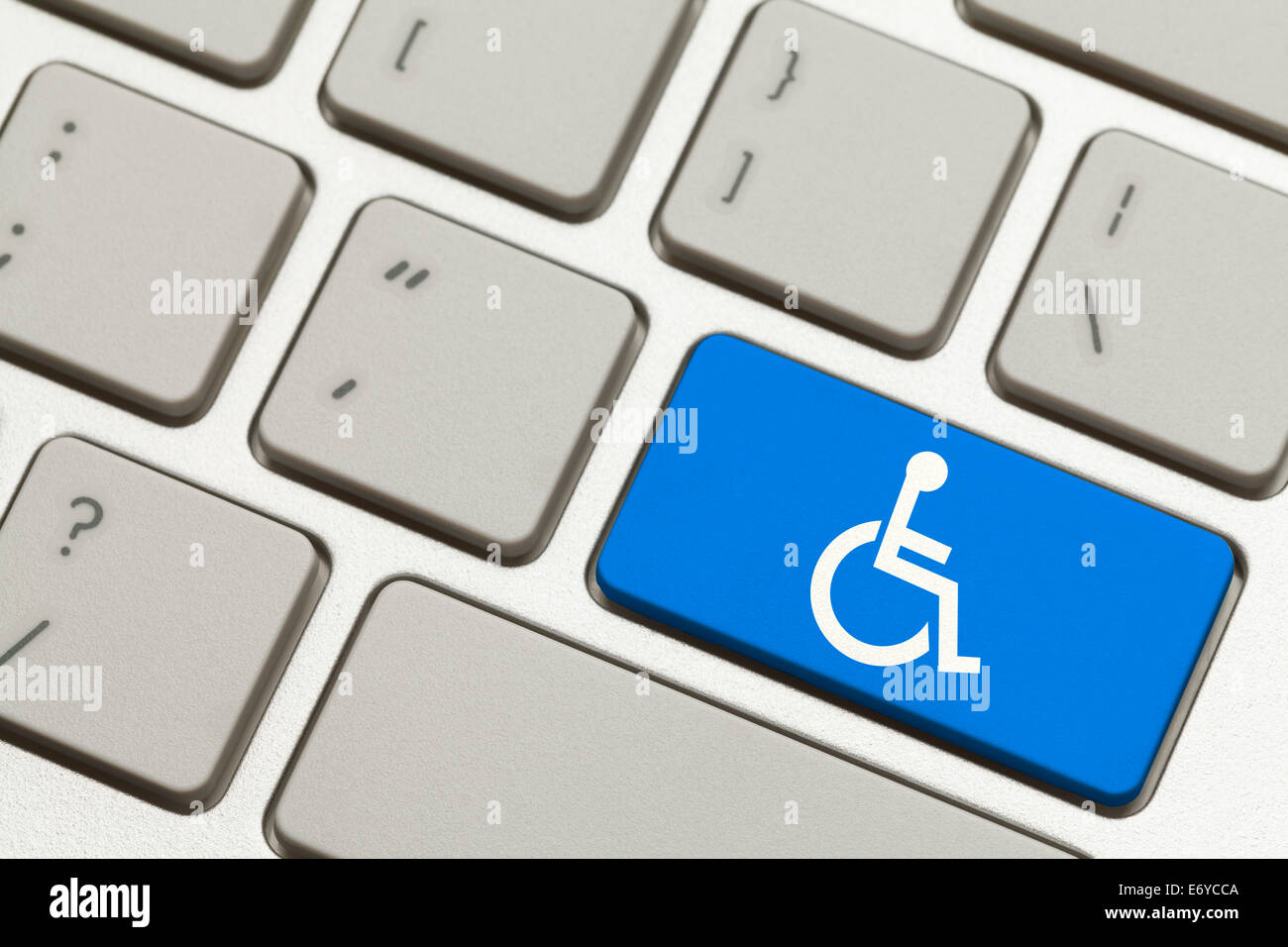 Close Up di Handicap blu pulsante a chiave su una tastiera. Foto Stock
