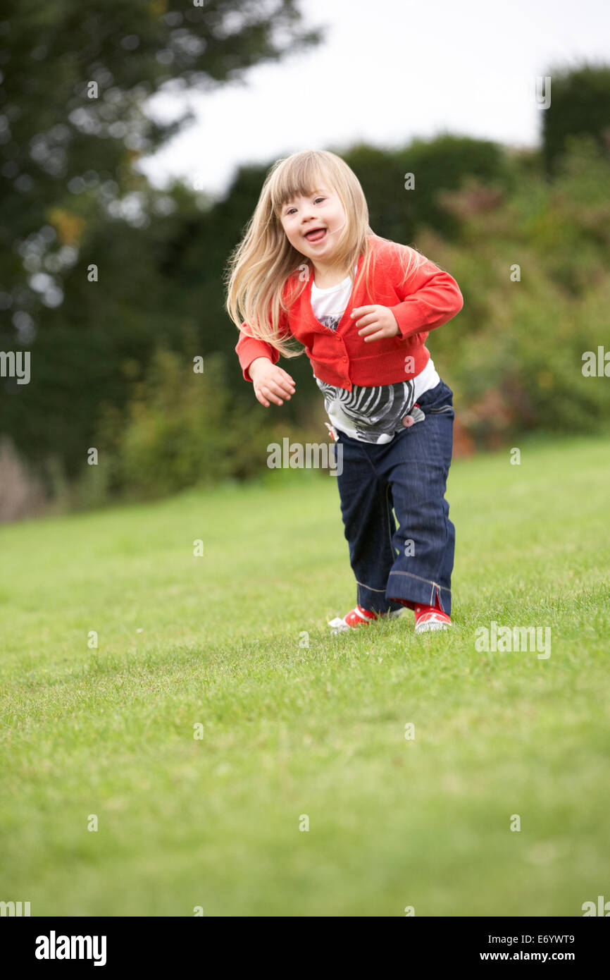 3 anno vecchia ragazza con la sindrome di Down Foto Stock