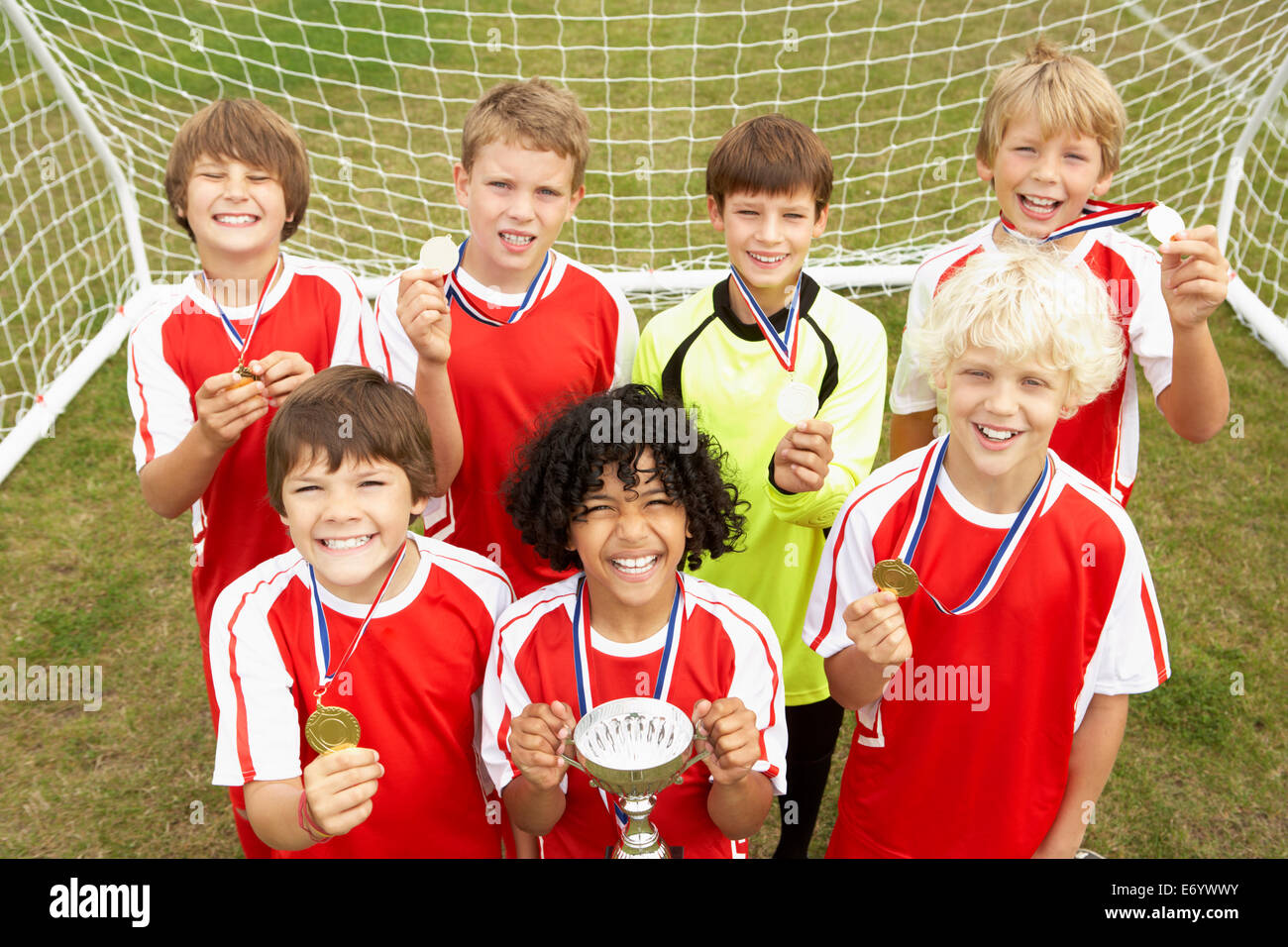 Vincendo Junior Soccer team ritratto Foto Stock