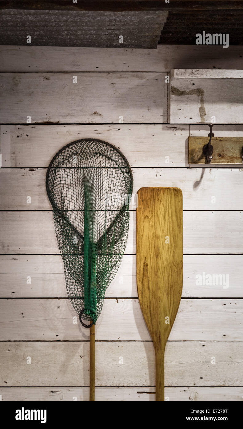 Rete da pesca e Remo boathouse Foto Stock