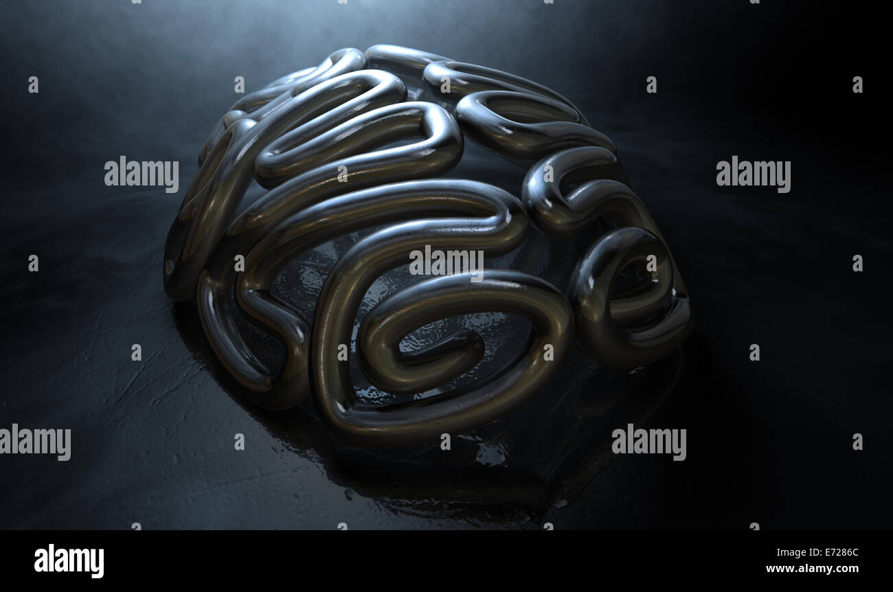 Una fusione in bronzo raffigurante un cervello stilizzato in contrasto luce su una misteriosa accesa isolato sfondo scuro Foto Stock