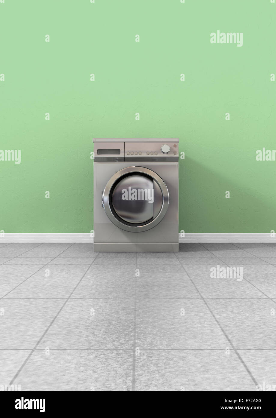 Una vista frontale di un vuoto regolari in metallo spazzolato lavatrice in una stanza vuota con un lucido pavimento piastrellato e un muro verde Foto Stock