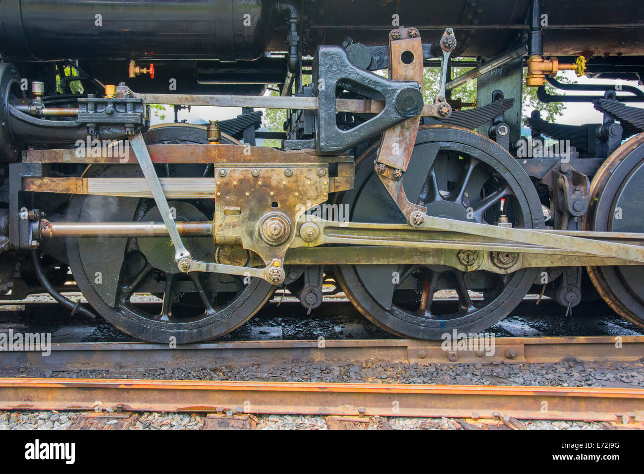 Le ruote di guida di una vecchia locomotiva a vapore Foto Stock