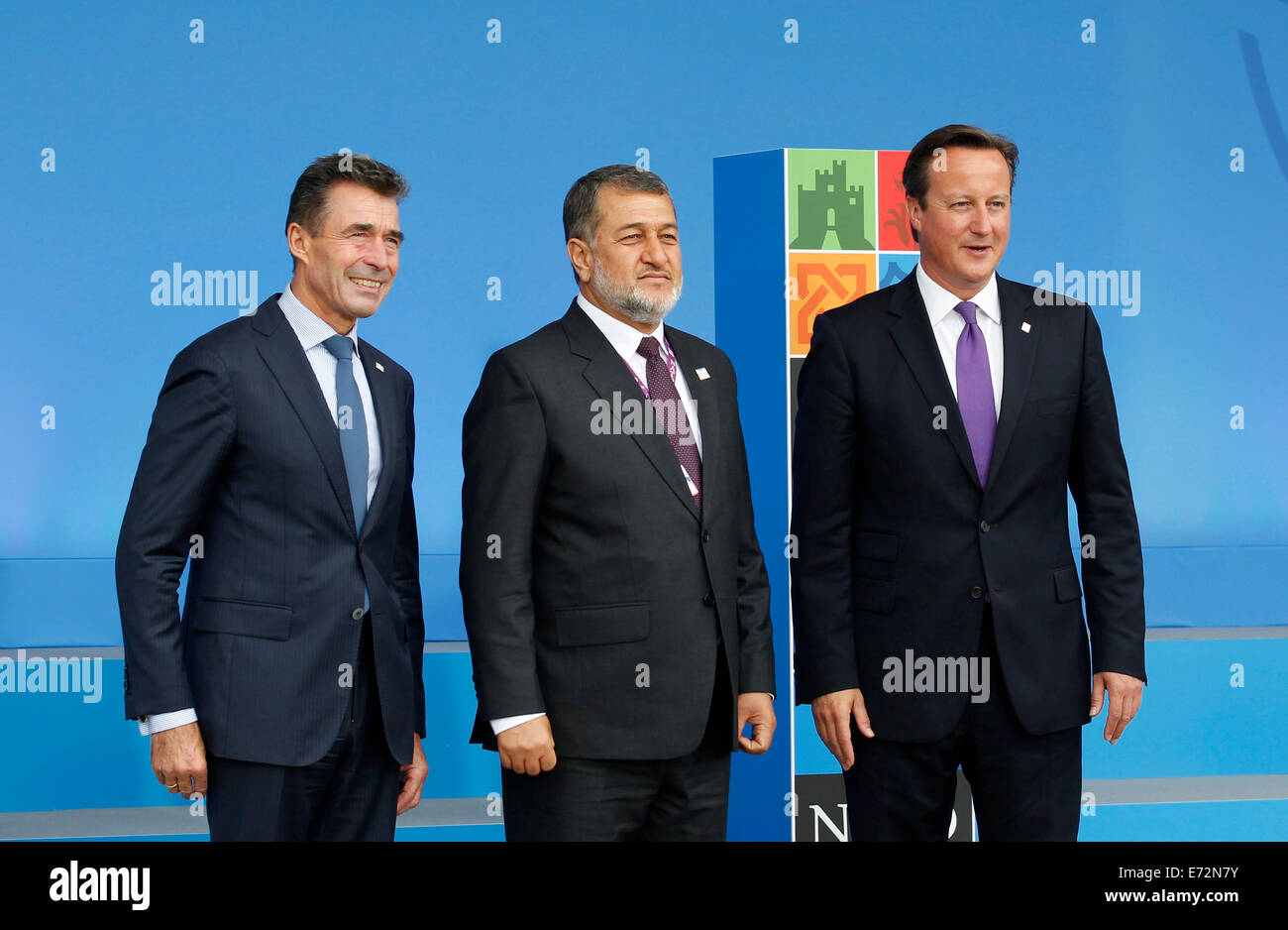 Newport, Gran Bretagna. 4 Sep, 2014. (Da l a r) il Segretario Generale della Nato Anders Fogh Rasmussen, difesa afgano Ministro Bismillah Khan Mohammadi e del Primo Ministro britannico David Cameron comportano per le foto durante il vertice della NATO 2014 a Newport, Galles, Gran Bretagna, sul Sett. 4, 2014. La due giorni di vertice NATO 2014 calci fuori in Galles il giovedì. Credito: Han Yan/Xinhua/Alamy Live News Foto Stock