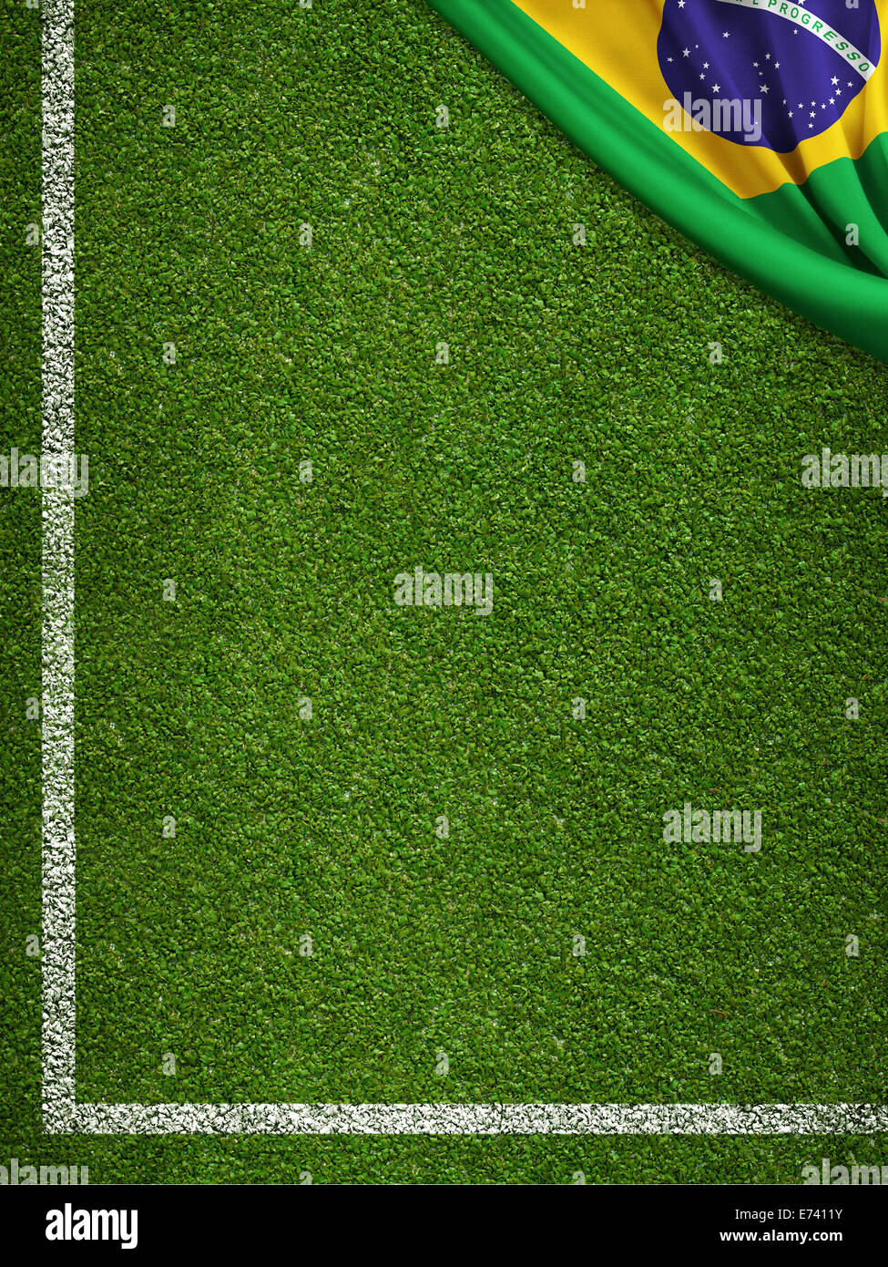 Campo di calcio con la bandiera del Brasile Foto Stock