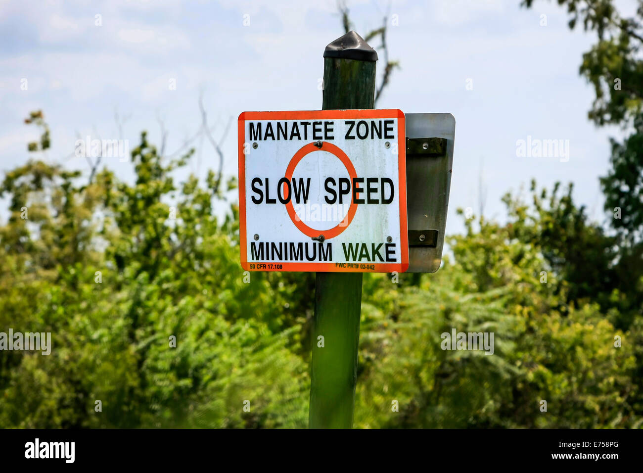 Zona Manatee cartello sul fiume di pace in SW Florida Foto Stock