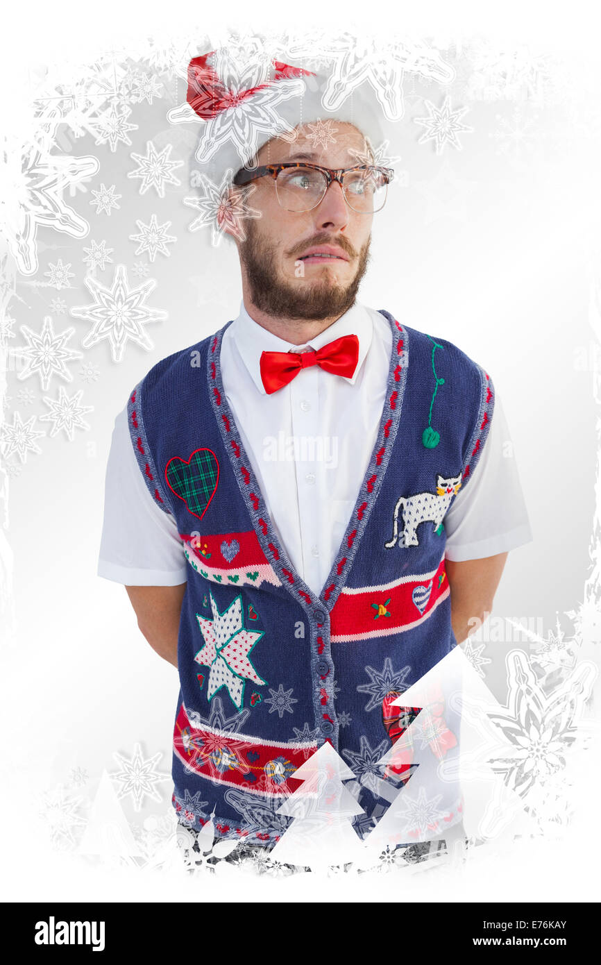 Immagine composita di geeky hipster in santa hat Foto Stock