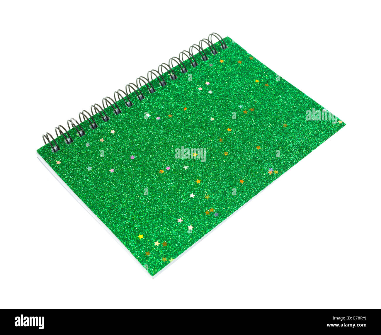 Un verde piccolo notebook con un coperchio di glitter su uno sfondo bianco. Foto Stock
