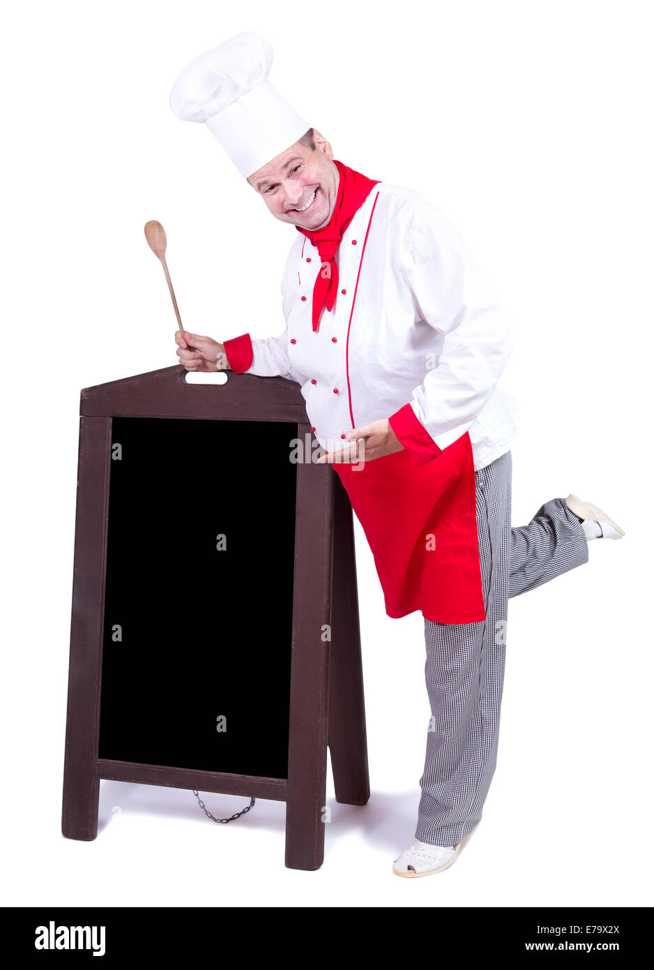 Lo chef felice in piedi con un menu vuoto Foto Stock